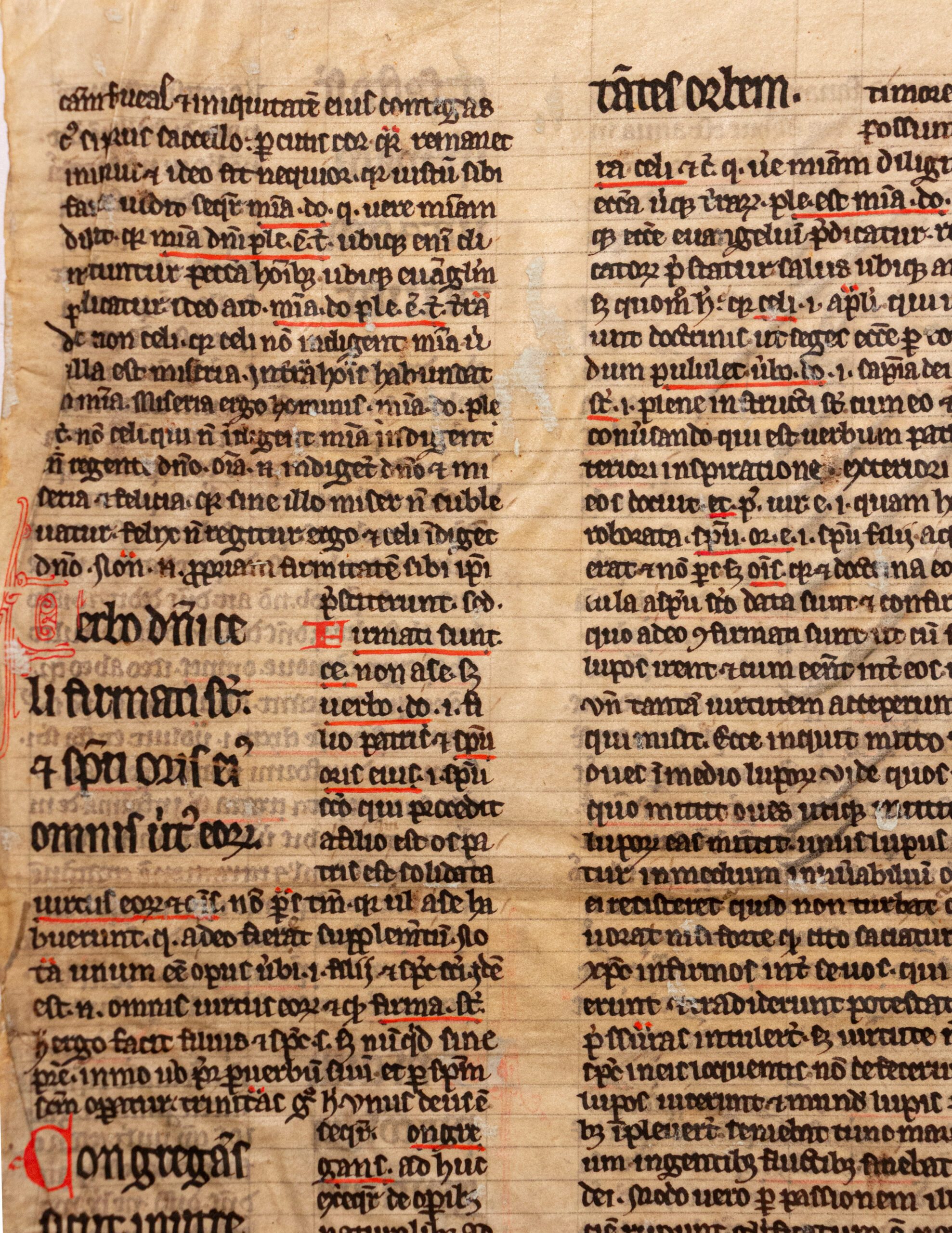 Glossed Bible leaf reused as a binding in French archive. France (doubtless Paris), 13th century.